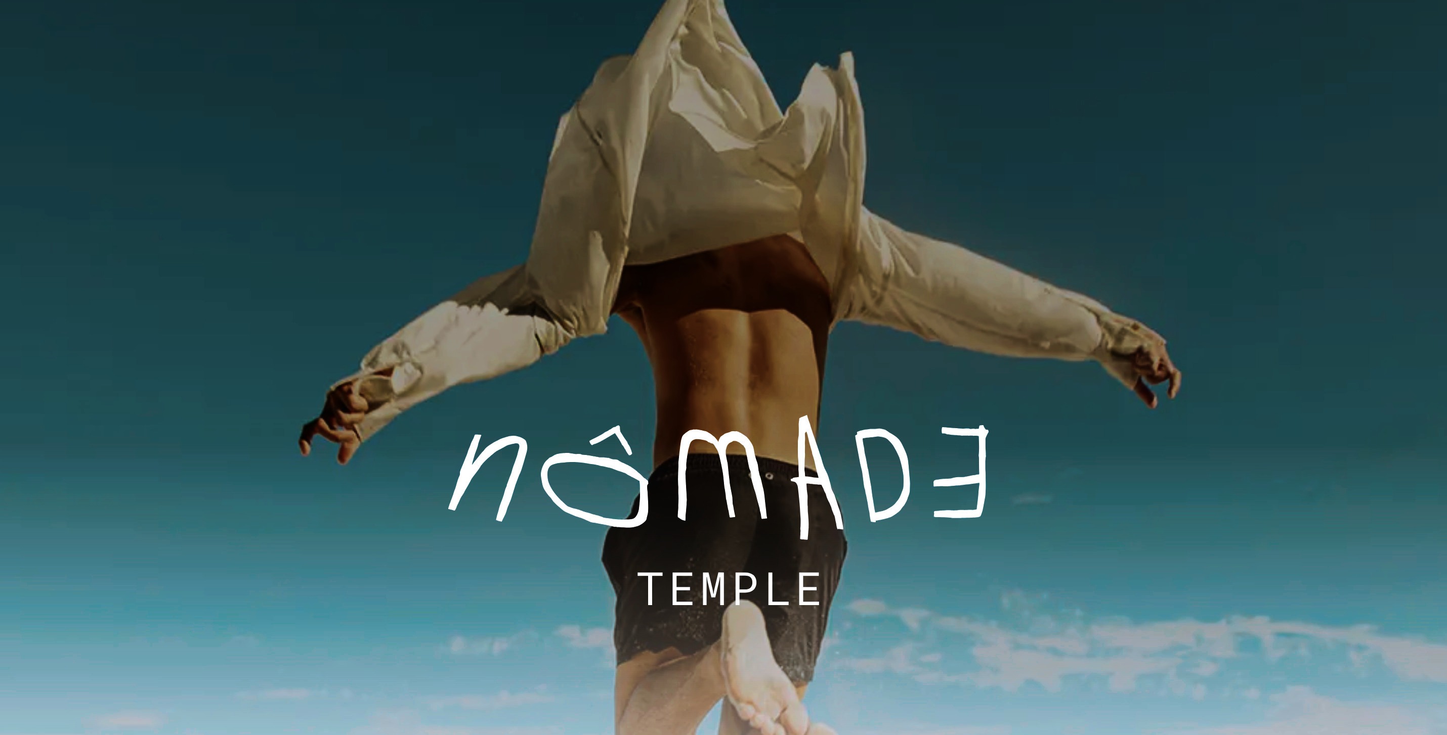 Nomade Temple promotional image showing a person in flowing white clothing against ocean backdrop